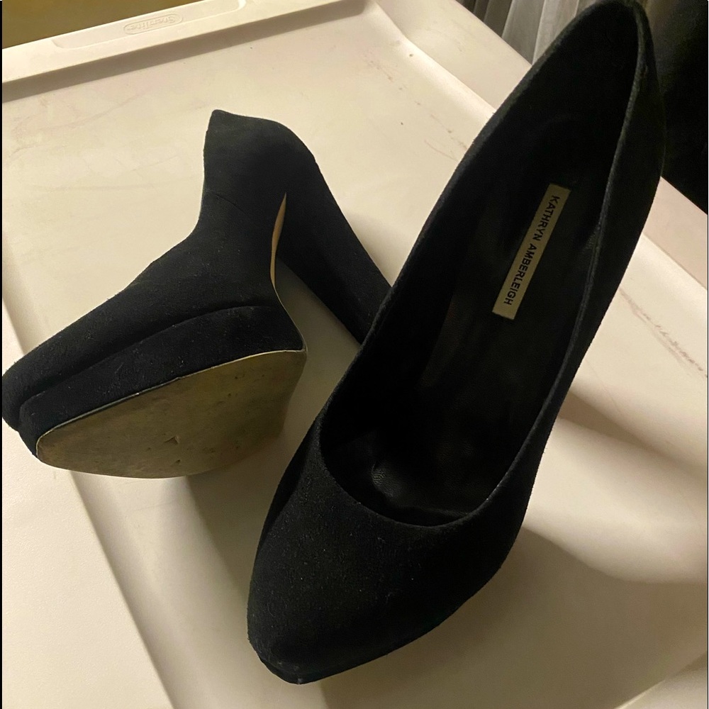 Black 4” platform heels.